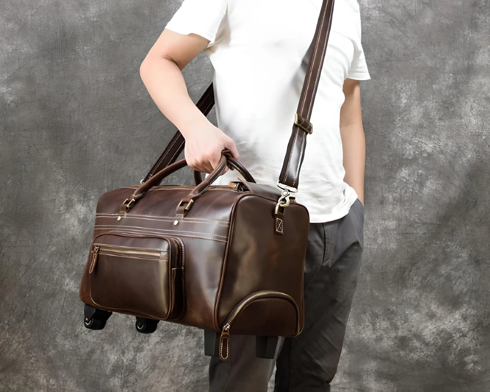 leather rolling carry on bag