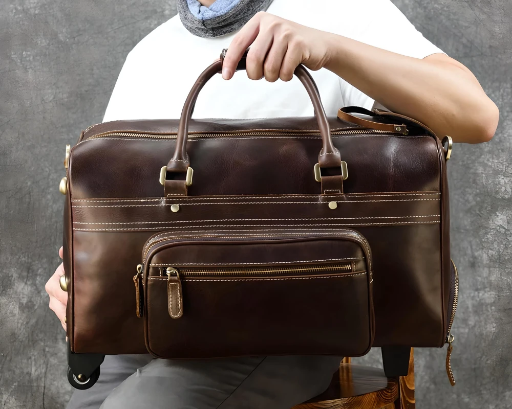 leather rolling carry on bag